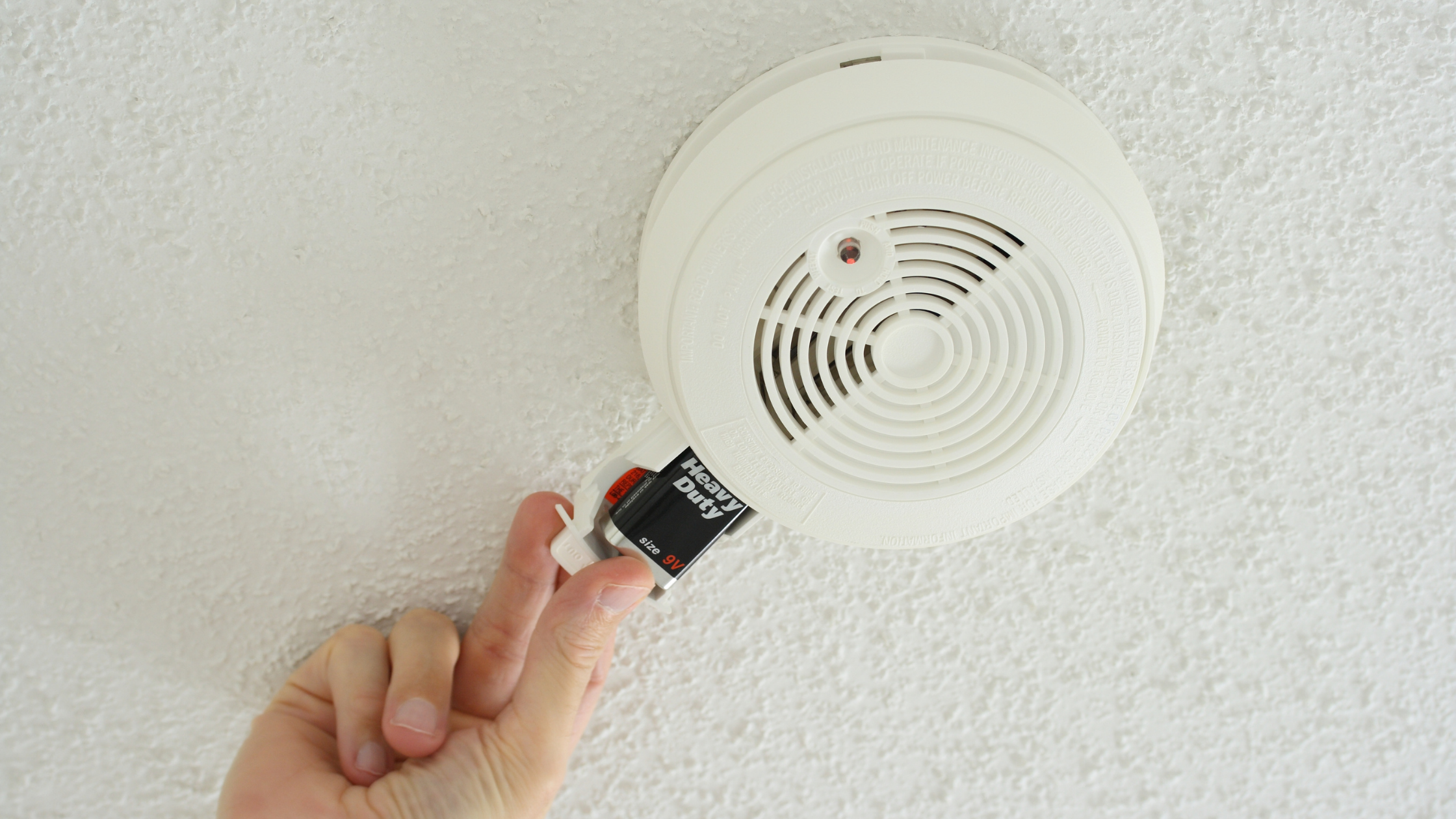 Changing the batteries to your smoke alarm in North Providence