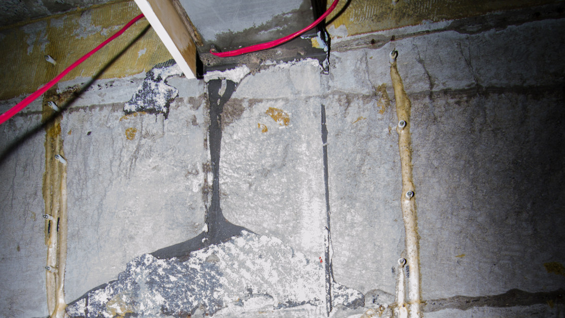 filling in water damaged cracks in basement in Rhode Island